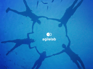 team holding hands in a circe with the Agile Lab logo in the middle.